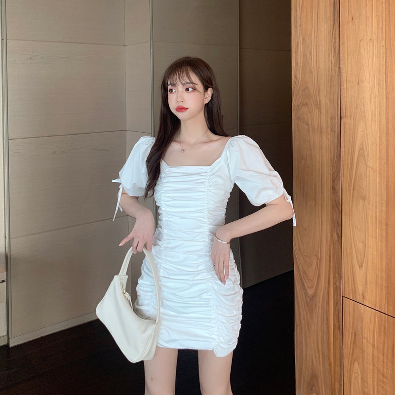 Slim-fit pleated dress