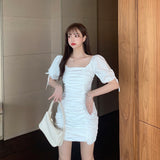 Slim-fit pleated dress
